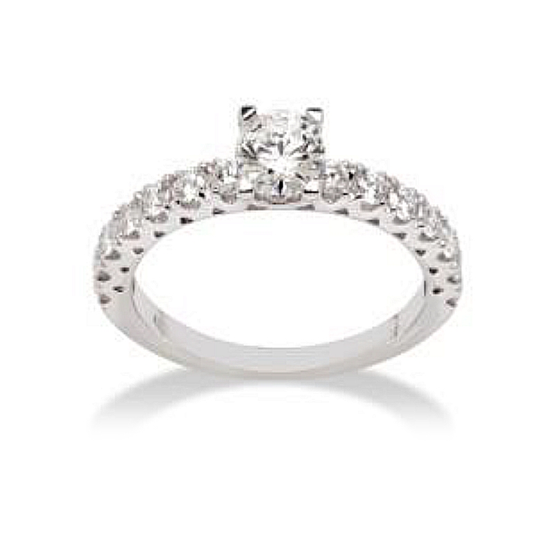 18 Kt. White Gold Solitaire with F VS 0,65 Ct. Natural Diamonds